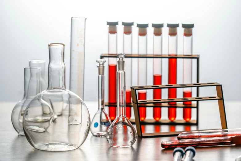 a group of laboratory equipment sitting on top of a table, a picture, by Konrad Witz, shutterstock, cover with a lot of red water, high school, 15081959 21121991 01012000 4k, image apothecary