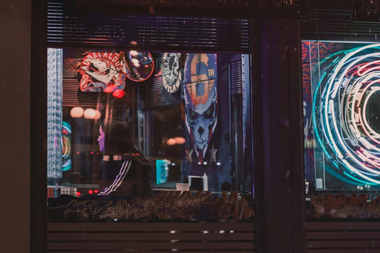 a woman sitting on a bench in front of a window, cyberpunk art, by Adam Marczyński, pexels contest winner, maximalism, taverns nighttime lifestyle, shop front, nychos, digital banner