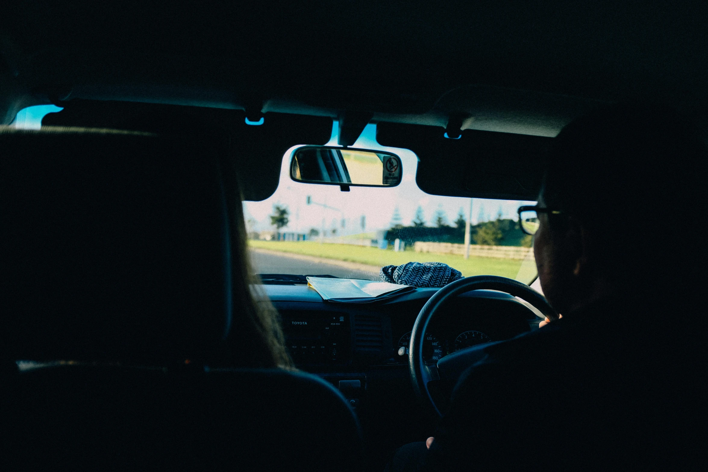 a couple of people that are sitting in a car, unsplash, te pae, worksafe. instagram photo, profile image, underexposed