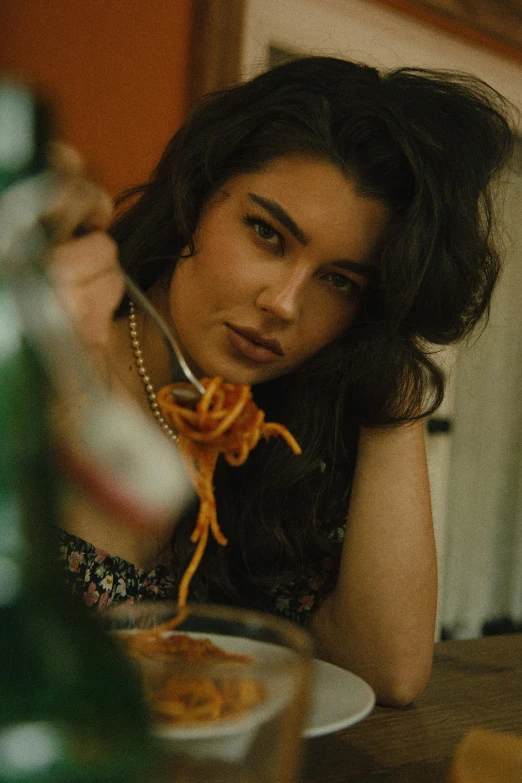 a woman sitting at a table with a plate of food, a portrait, inspired by Elsa Bleda, pexels contest winner, renaissance, :: madison beer, spaghetti western, close-up portrait film still, charli xcx