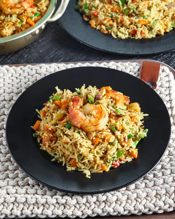 a close up of two plates of food on a table, inspired by Li Di, shutterstock contest winner, hurufiyya, rice, prawn, on grey background, multicoloured