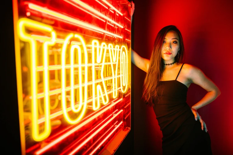 a woman standing in front of a neon sign, pexels contest winner, toyism, beautiful asian girl, elegantly posing over you, ukiyo, neon standup bar