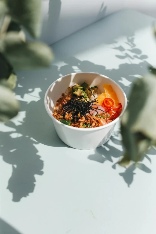 a bowl of food sitting on top of a table, unsplash, detailed product image, outside view, sana takeda, san francisco