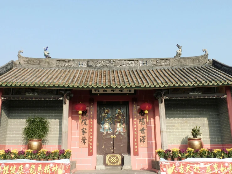 a building with a bunch of potted plants in front of it, a picture, inspired by Guo Chun, cloisonnism, shaved temple, tai chi, 王琛, deity)