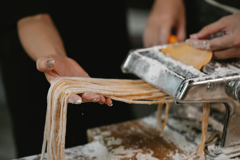 a person that is making some kind of pasta, pexels contest winner, rectangle, up close, demo scene, amanda lilleston