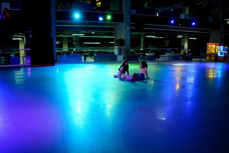 a couple of kids sitting on top of a skateboard, by Tom Bonson, unsplash, process art, violet and aqua neon lights, floor b2, ice blue, square