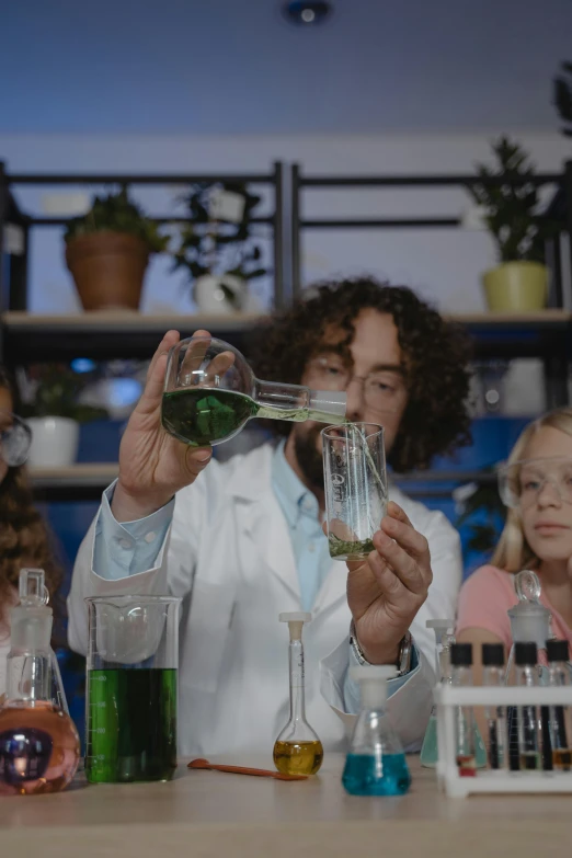 a group of children working in a science lab, trending on pexels, renaissance, thin male alchemist, algae, trending on 8k, bong