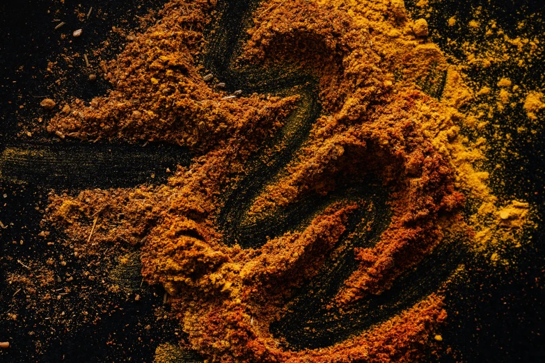 a pile of spices sitting on top of a table, a digital rendering, by Adam Marczyński, trending on pexels, hurufiyya, high angle close up shot, intricate oil sweeps, yellow ochre, psychedelic dust