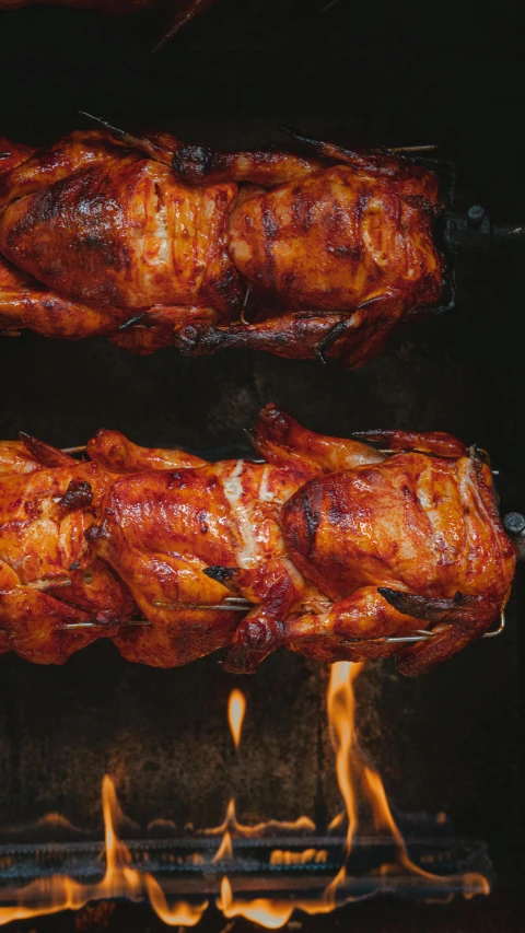 a bunch of meat sitting on top of a grill, profile image, bird view, thumbnail, grilled chicken