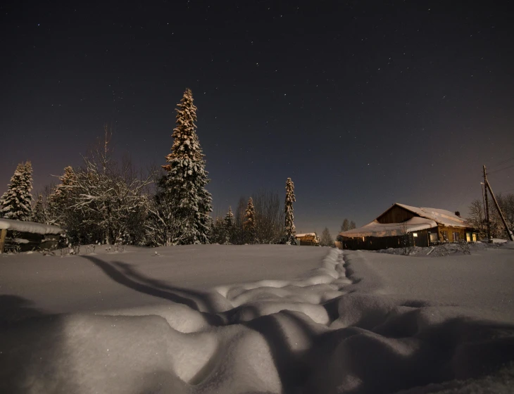 a snow covered field with a cabin in the background, pexels contest winner, hurufiyya, moonlit parking lot, alaska, ultrawide angle, high resolution image