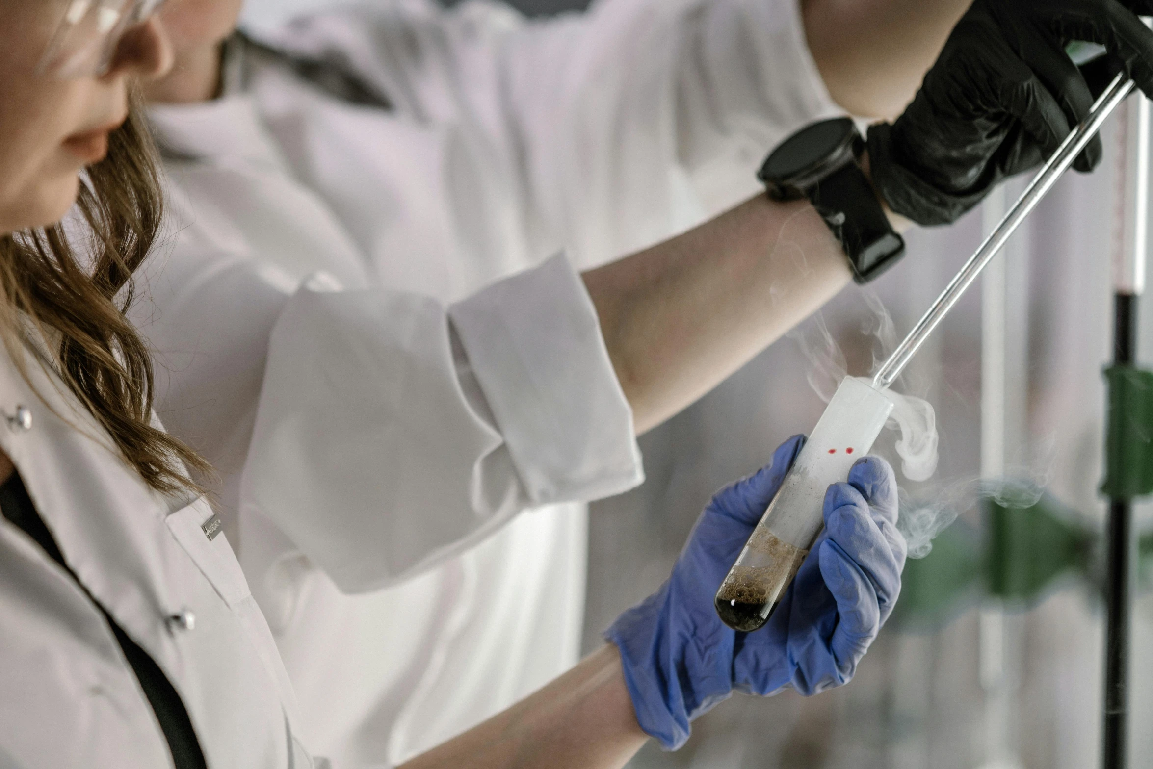 a close up of a person in a lab coat, holding a staff, high temperature, thumbnail, resin