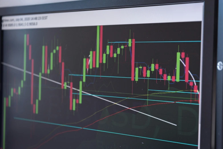 a computer monitor sitting on top of a desk, by Daniel Lieske, pexels, analytical art, currency symbols printed, graph signals, trading, cinematic still frame