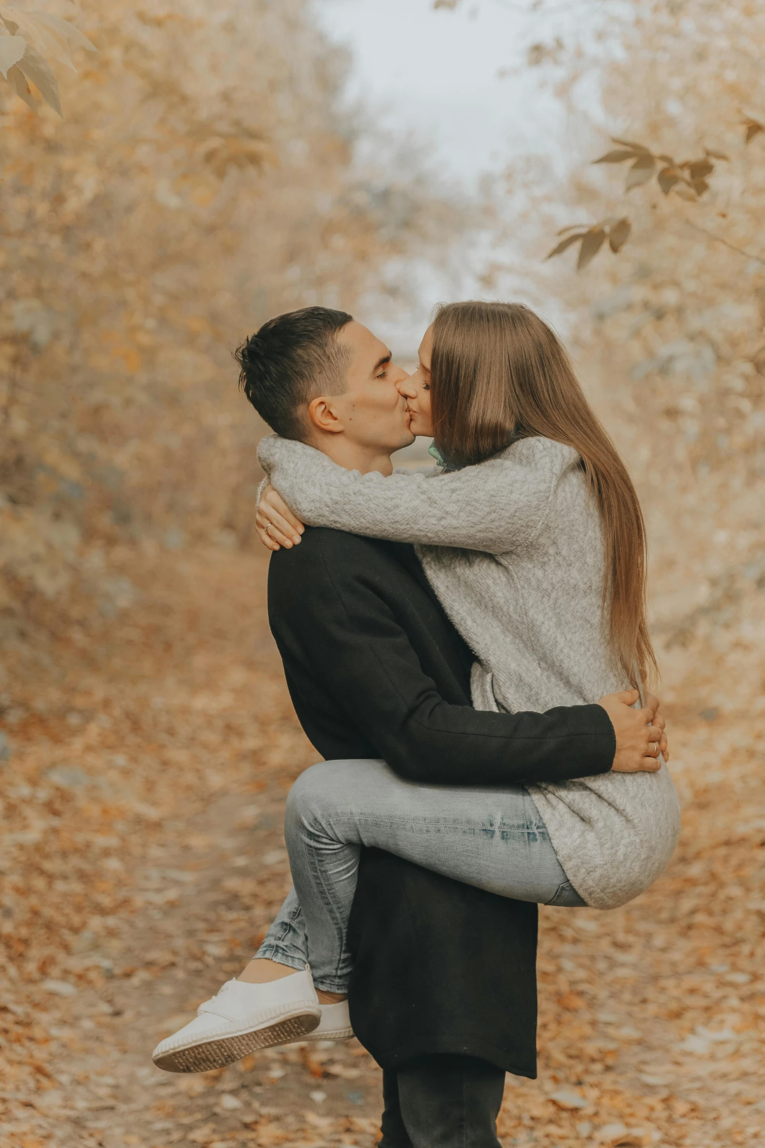 a man carrying a woman on his back in the woods, pexels contest winner, romanticism, kissing each other, 🍂 cute, flawless structure, gif