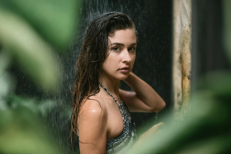 a beautiful young woman standing in the rain, inspired by Elsa Bleda, pexels contest winner, renaissance, in a tropical forest, natalia dyer, wet swimsuit, portrait sophie mudd