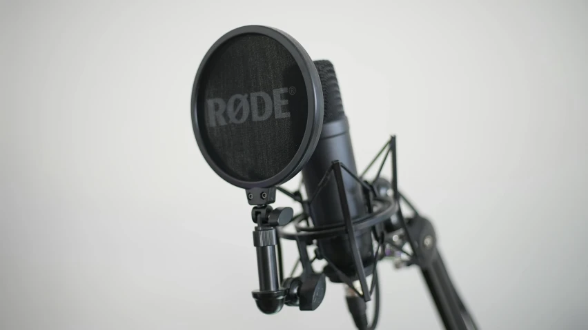 a microphone with the word rode written on it, material pack, all black matte product, 3 0 0 mm, full res