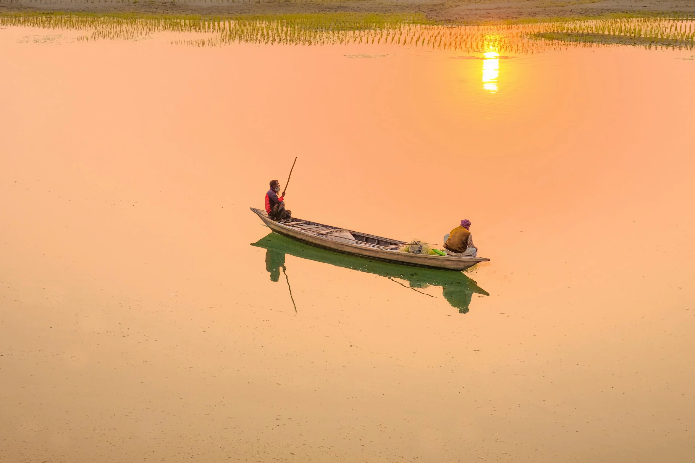 two people in a small boat on a body of water, by Eglon van der Neer, pexels contest winner, sunrise colors, assam tea village background, fishing, pastel hues