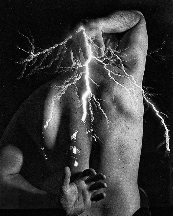 a black and white photo of a man holding a lightning bolt, by Robert Mapplethorpe, surrealism, splashes of lightning behind her, muscular men entwined together, subatomic electrons! in love, electricity archs