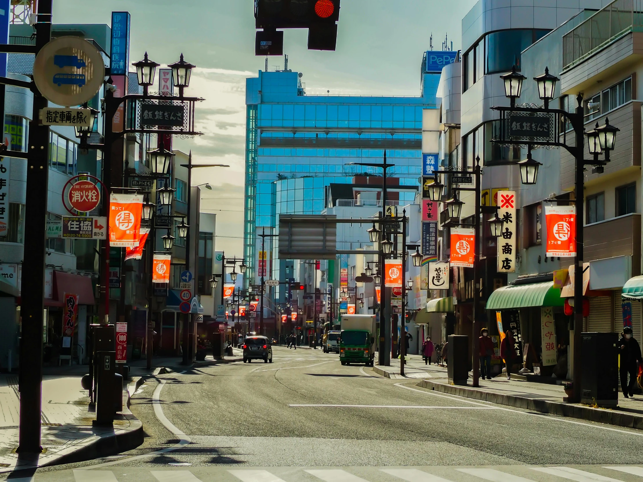 a city street filled with lots of tall buildings, a picture, unsplash, ukiyo-e, square, late afternoon, kumamoto, high quality image