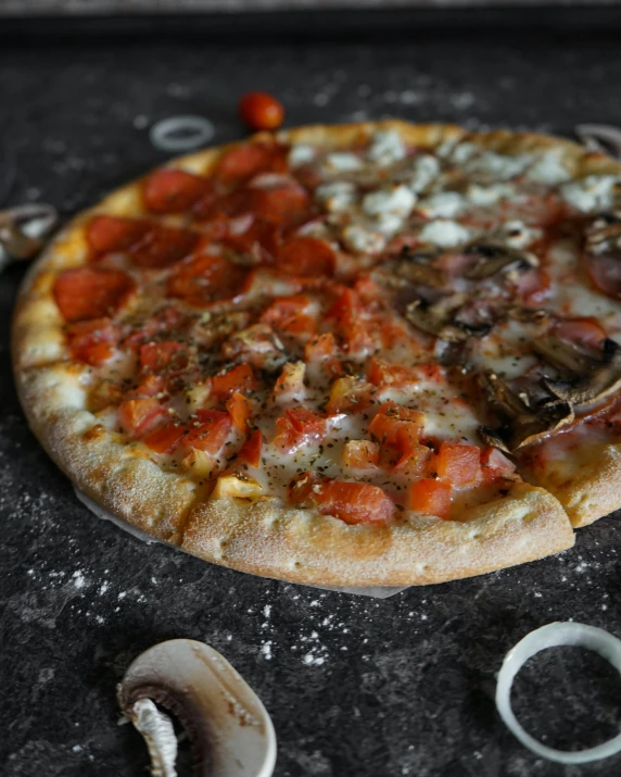 a pizza sitting on top of a pan covered in toppings, profile image