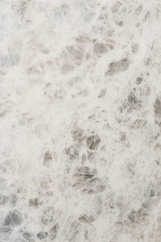 a man riding a wave on top of a surfboard, marble texture, light grey, silver，ivory, medium close - up ( mcu )