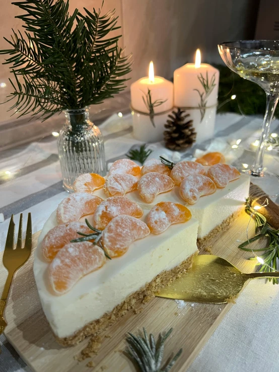 a cake sitting on top of a wooden cutting board, inspired by Hedda Sterne, reddit, very soft diffuse lights, holiday vibe, white and orange, christmas night