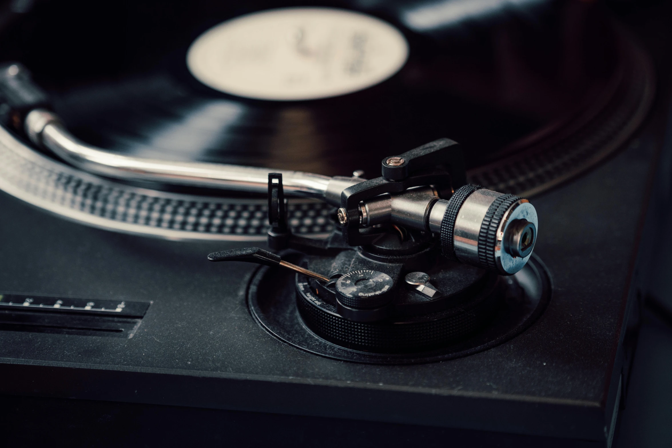 a close up of a record player's turntable, trending on pexels, private press, instagram post, shot on canon eos r 5, various styles, a high angle shot