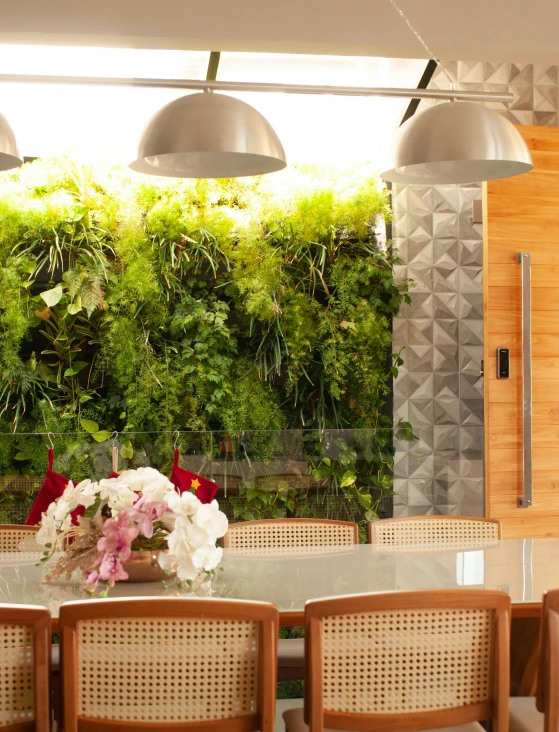 a dining room table with a bunch of chairs, vertical gardens, profile image, lush landscaping, brown