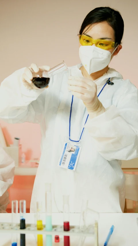 a woman in a lab coat holding a test tube, an album cover, unsplash, shin hanga, low quality photo, bts, thumbnail, shot on iphone 1 3 pro max