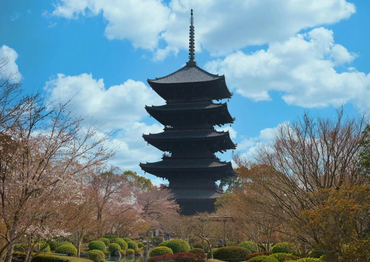 there is a pagoda in the middle of the park, inspired by Itō Jakuchū, pexels contest winner, shin hanga, blue sky, tall spires, 2022 photograph, exterior