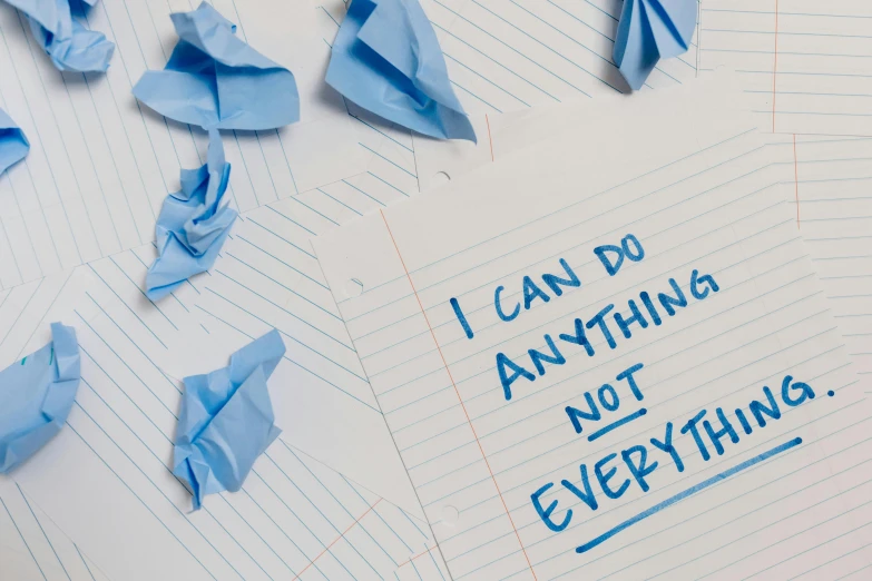a piece of paper with the words i can do anything not everything, an album cover, inspired by Tracey Emin, unsplash, antipodeans, ((blue)), bullying, origami, bo burnham