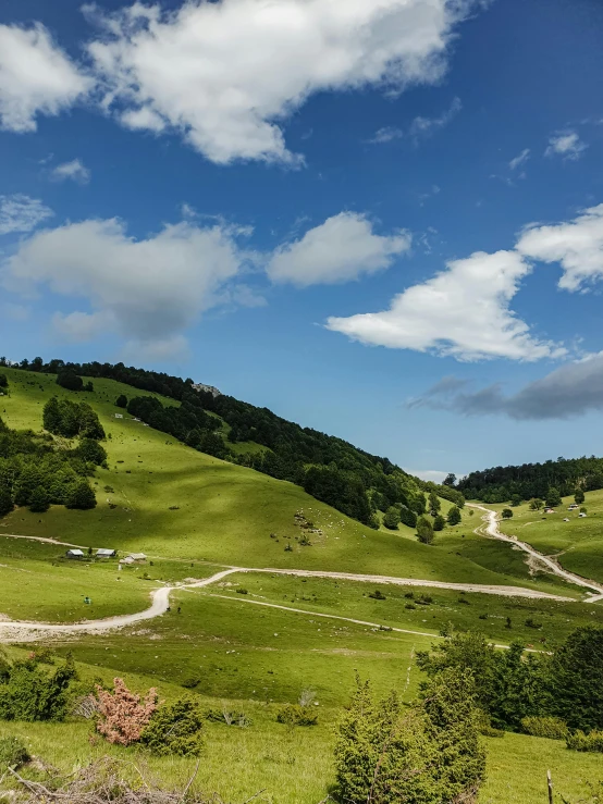 a dirt road winding through a lush green valley, by Matthias Stom, pexels contest winner, renaissance, square, thumbnail, festivals, italy