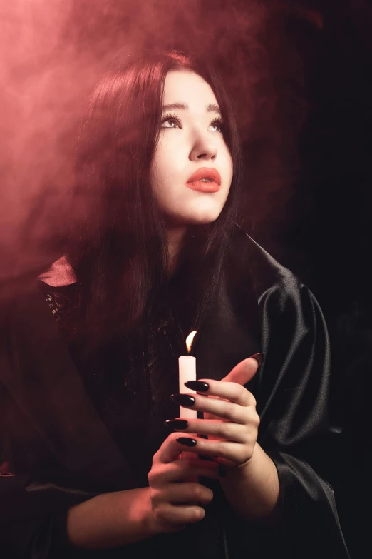 a woman holding a lighter in her hand, an album cover, inspired by Itō Shinsui, unsplash, surrealism, cruel korean goth girl, mahira khan as a mage, dark. studio lighting, ulzzang