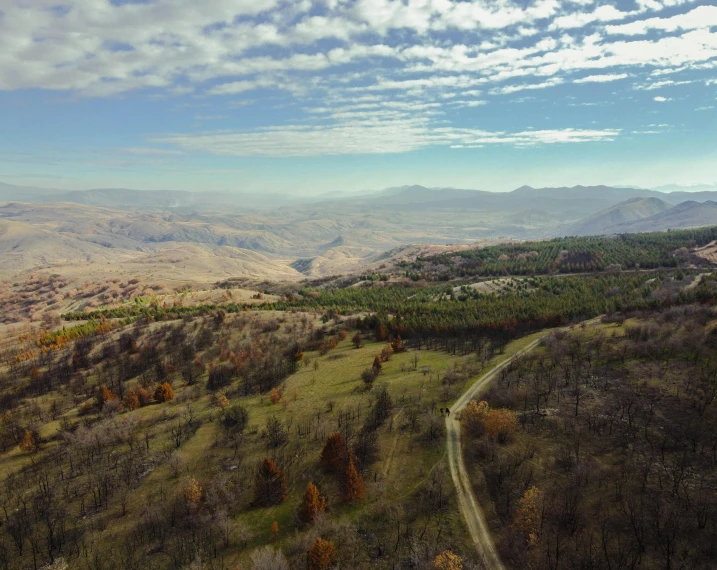 a view of the mountains from the top of a hill, by Muggur, pexels contest winner, les nabis, aerial footage, southern slav features, overlooking a valley with trees, malibu canyon