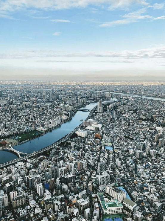 an aerial view of a city with a river running through it, inspired by Tadao Ando, pexels contest winner, happening, tokujin yoshioka, panoramic view, highly detailed in 4 k ”, hyperrealistic ”