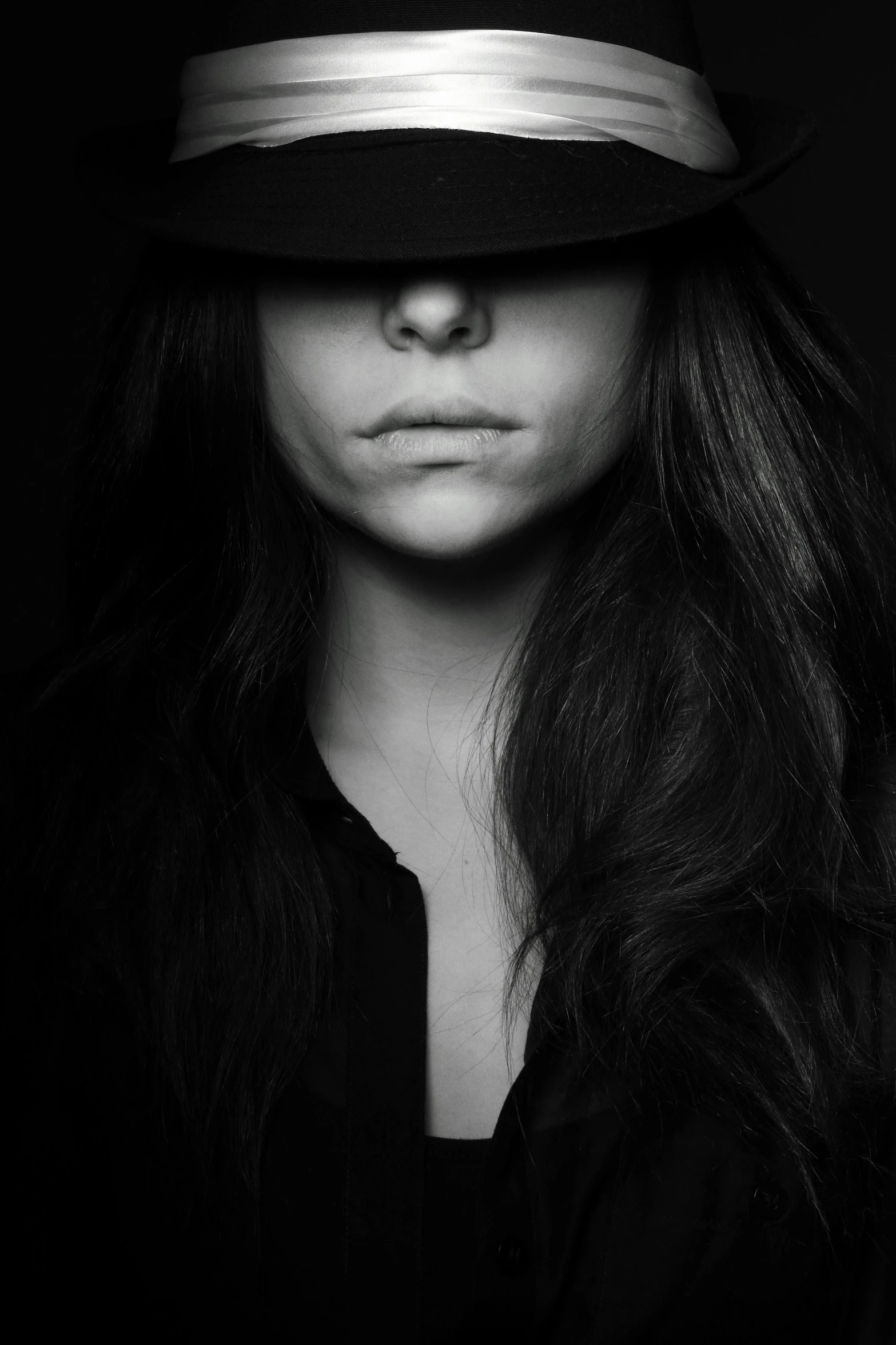 a black and white photo of a woman wearing a hat, demon days, dark undertones, nina dobrev, shady