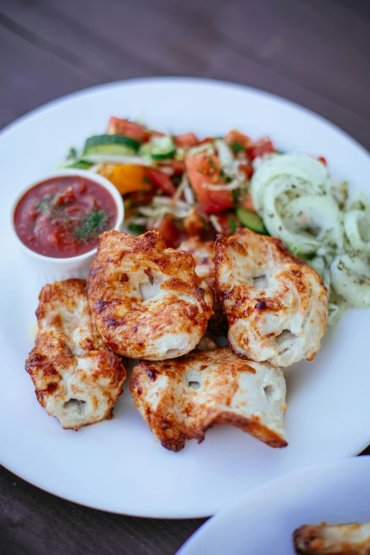 a close up of a plate of food on a table, profile image, jajaboonords flipjimtots, restaurant, grilled chicken