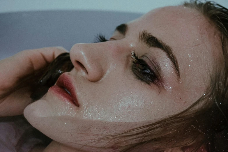 a close up of a person talking on a cell phone, a photorealistic painting, inspired by Elsa Bleda, trending on pexels, hyperrealism, milk bath photography, looking exhausted, in style of nan goldin, skincare