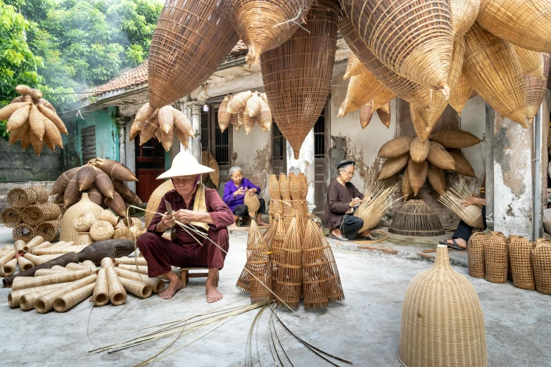 a person sitting in front of a bunch of baskets, pexels contest winner, process art, vietnamese temple scene, people at work, avatar image