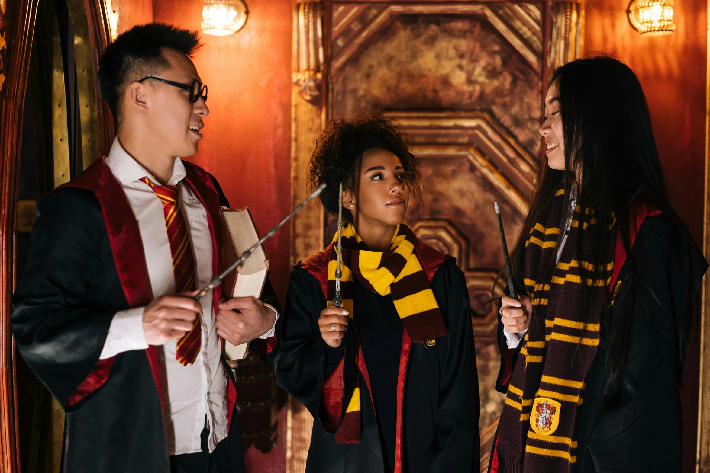 a group of young people standing next to each other, inspired by Hermione Hammond, hurufiyya, hogwarts gryffindor common room, an escape room in a small, profile image, louise zhang