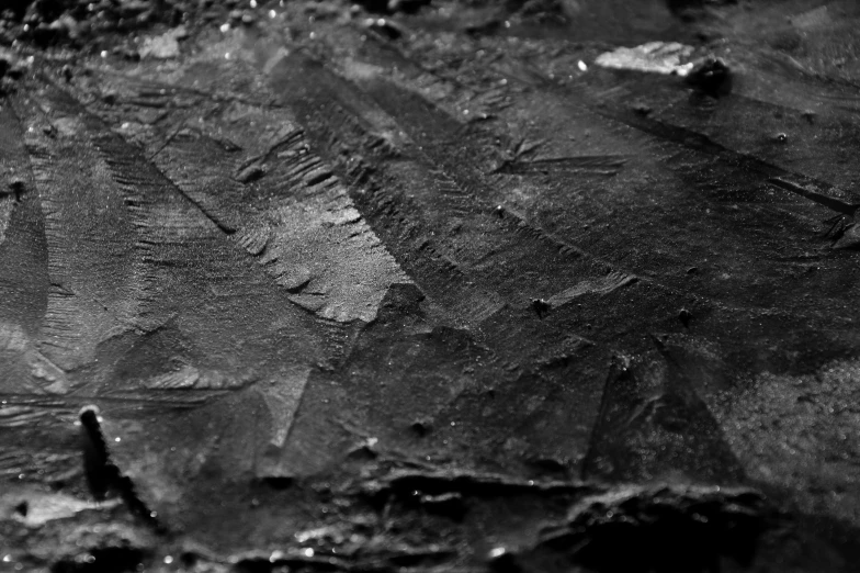 a black and white photo of some rocks, a microscopic photo, pexels, lyrical abstraction, 3dcoat h 648, made of tar, dark wallpaper, glittering ice