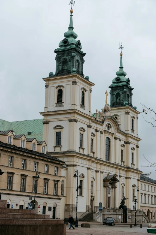 a large building with a clock tower in front of it, inspired by Károly Markó the Elder, baroque, holy cross, domes, zoomed out to show entire image, 2 5 6 x 2 5 6 pixels
