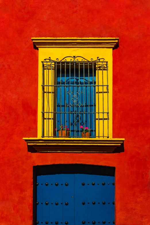 a red building with a blue door and window, a painting, pexels contest winner, mexican, yellow and ornage color scheme, square, morning detail