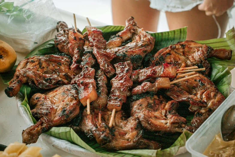 a close up of a plate of food on a table, five foot bat in the philippines, barbecue, 6 pack, thumbnail