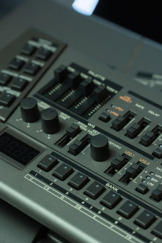 a computer keyboard sitting on top of a desk, futuresynth, roland, close - up on detailed, casette futurism