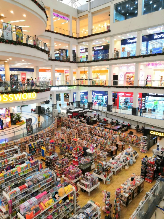 a large book store filled with lots of books, reddit, maximalism, in magnificent shopping mall, high view, 2 5 6 x 2 5 6 pixels, ross tan