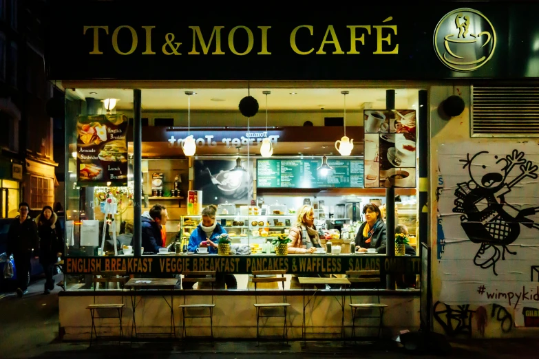 a group of people standing in front of a restaurant, inspired by Mór Than, at night time, diner caffee, award winning shopfront design, profile image