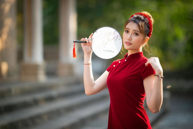 a woman in a red dress holding a white frisbee, a portrait, inspired by Gong Xian, pexels contest winner, pretty face sharp chine, hd wallpaper, silver, sakimichan hdri