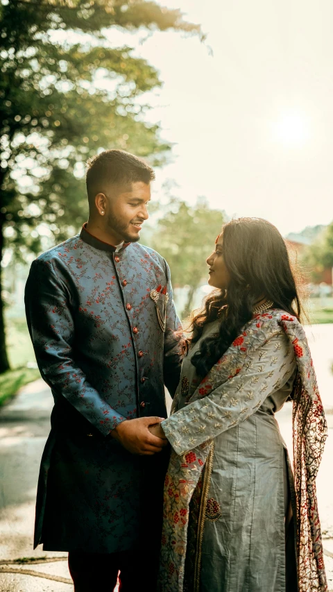 a man and woman standing next to each other, a colorized photo, pexels contest winner, hurufiyya, wearing a silk kurta, romantic lead, thumbnail, - 6