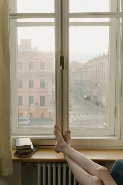 a woman sitting on top of a bed next to a window, inspired by Anka Zhuravleva, unsplash contest winner, knee high socks, saint petersburg, :: morning, window in foreground