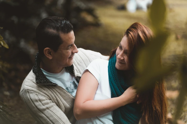 a man and woman hugging each other in the woods, pexels contest winner, happening, chilean, avatar image, close up portrait photo, thumbnail